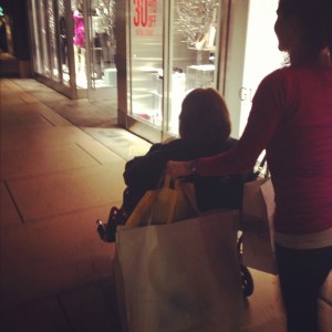 We also learned Mom's wheelchair doubles as shopping bag storage